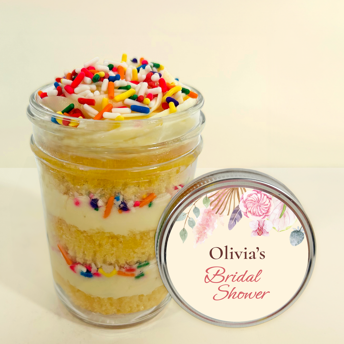 Lid label detail on a vanilla sprinkles kosher cupcake jar.