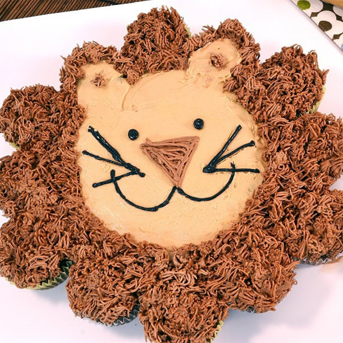 Lion Kosher Cupcake Cake, close-up view of the pull-apart lion cupcake arrangement