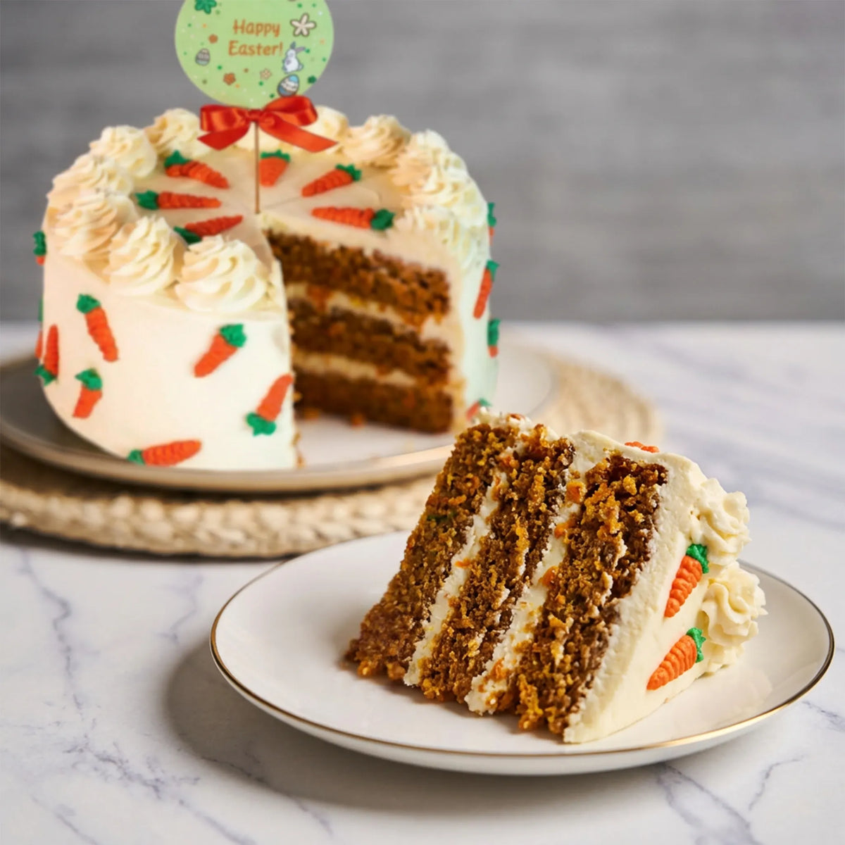 Sliced Easter carrot cake showing spiced carrot layers with cream cheese frosting and icing carrots on the side, kosher, made in Chestnut Hill MA