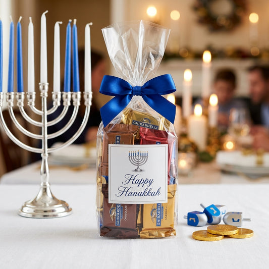 Ghirardelli squares candy bag tied with a royal blue ribbon and a printed Happy Hanukkah menorah graphic label at a Hanukkah gathering, kosher, made in Chestnut Hill MA
