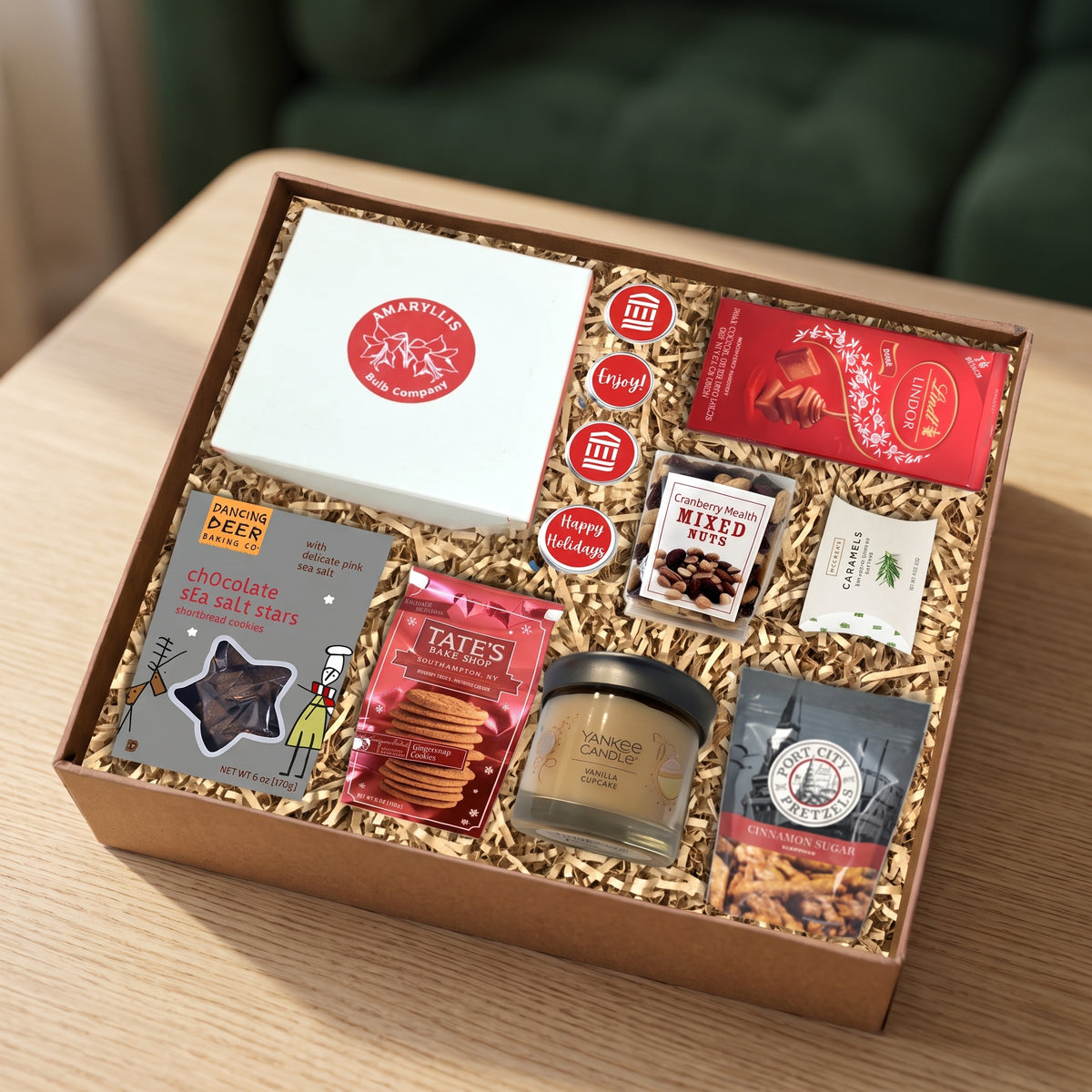 Amaryllis gift set box with an amaryllis bulb kit, chocolate covered Oreos, Lindt chocolates and gourmet cookies