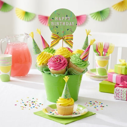 Seven cupcakes in yellow, pink and green buttercream with paper party hats in a lime green pail with a Happy Birthday topper, kosher, made in Chestnut Hill MA