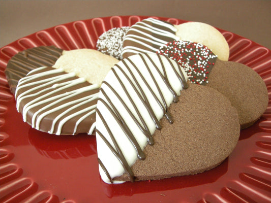 Kosher heart cookies dipped in dark and white chocolate