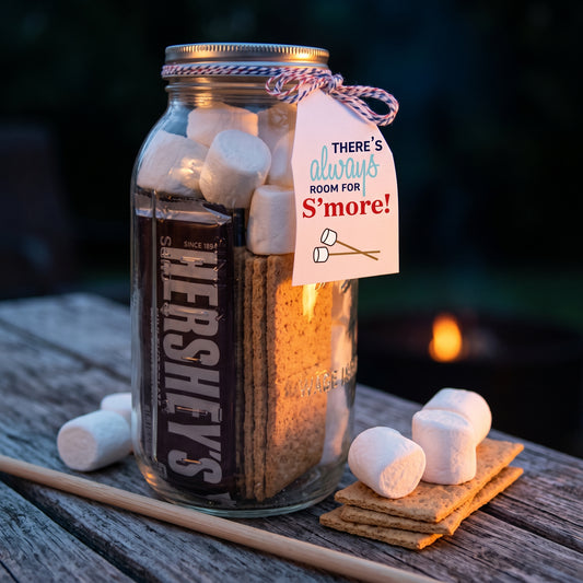 Sweet s'mores kit in a reusable mason jar with graham crackers, marshmallows, Hershey's bars and roasting sticks