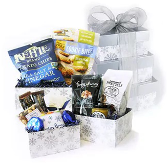 Large holiday gift tower of stacked gift boxes filled with truffles, shortbread cookies, mixed nuts and gourmet popcorn, filling option two